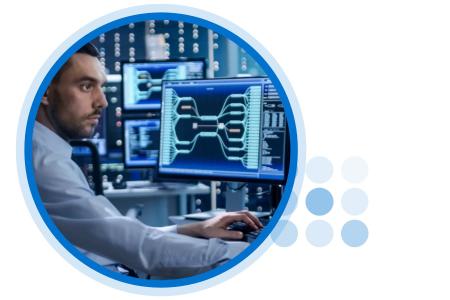 Person in front of multiple monitors in cybersecurity command center