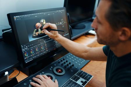 Person using a Wacom Cintiq Pro 22 tablet
