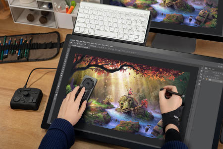 Graphic designer using a stylus on a tablet with Splashtop for creative work